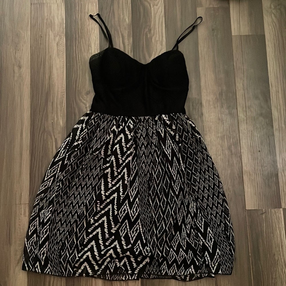 Black corset top dress with flowy bottom